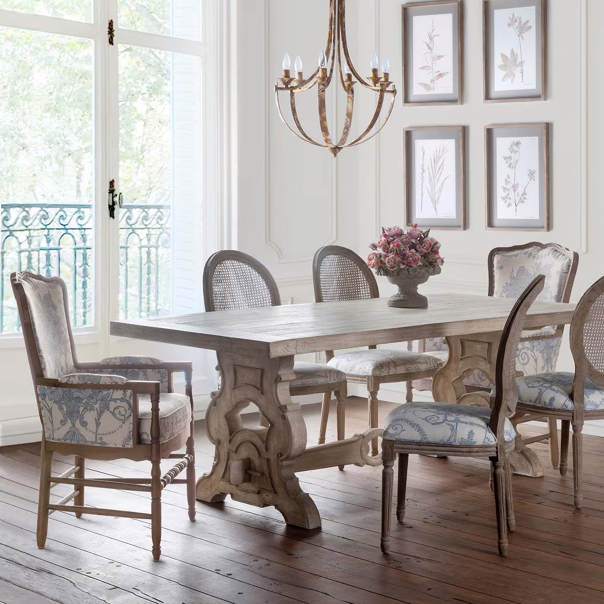 Vintage dining room with ornate table and chairs, capturing timeless craftsmanship and elegance for home