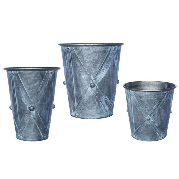 Antique farmhouse galvanized metal planters set of 3 with rustic textures and vintage detailing.