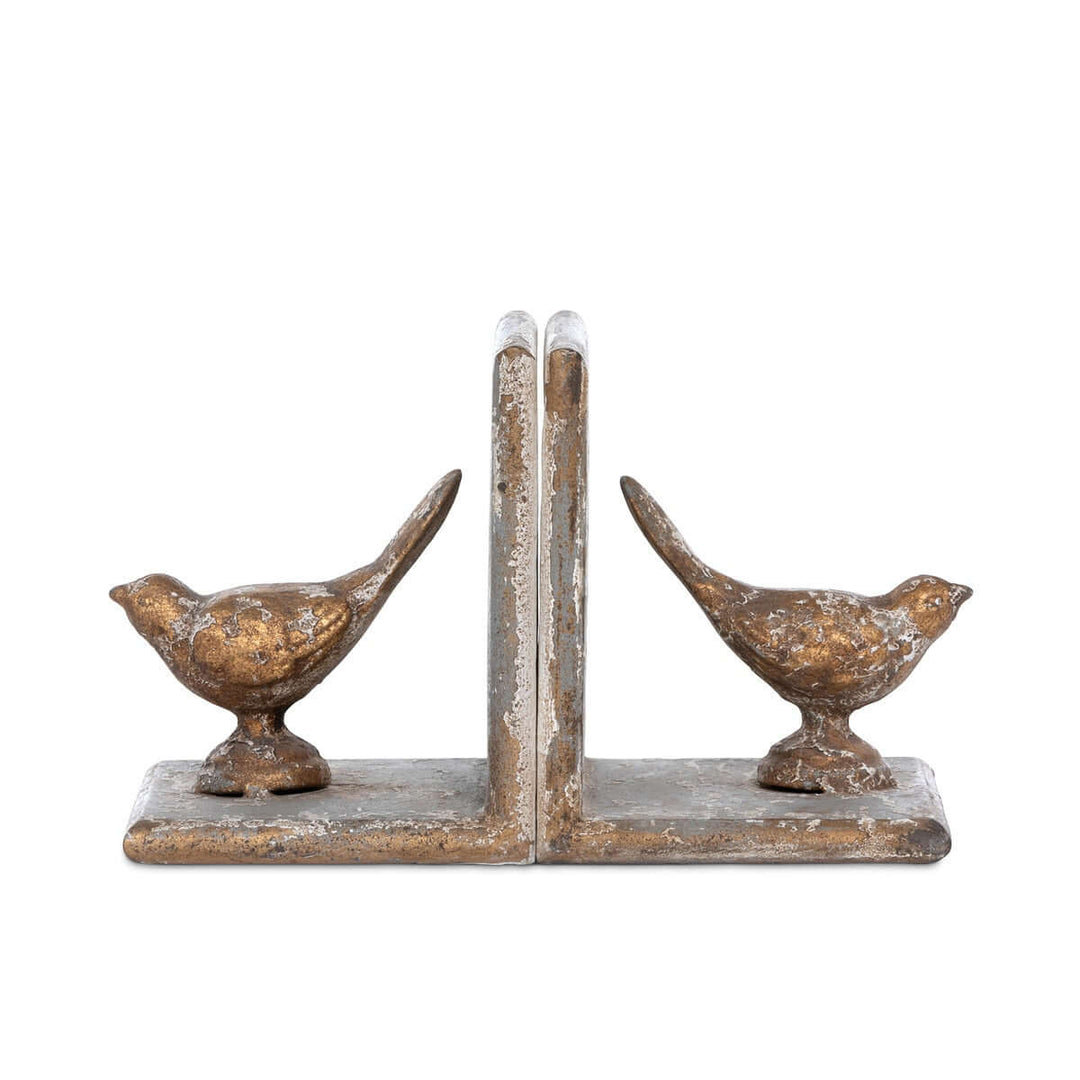 Vintage metal bird bookends crafted from solid iron with gilded accents, perfect for a charming and sturdy bookshelf accessory.