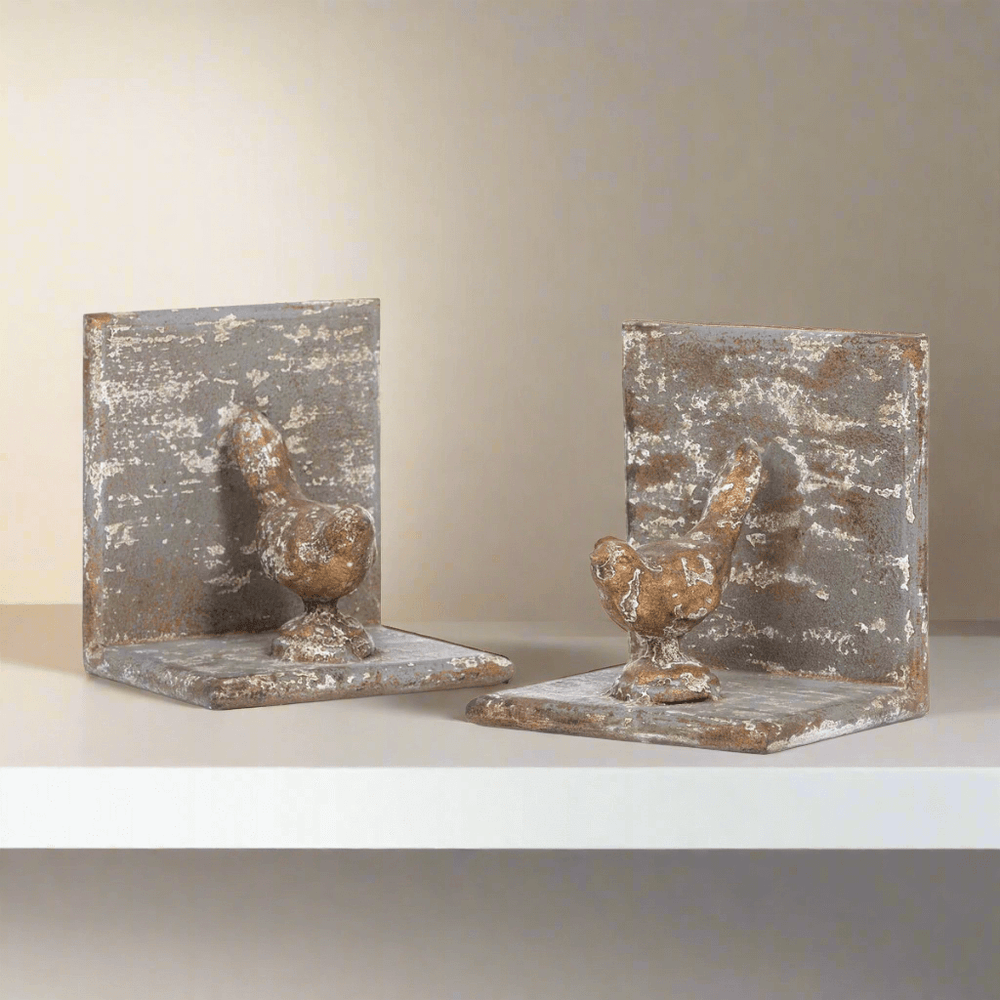 Vintage metal bird bookends with rustic finish, crafted from solid iron and gilded accents, evoking a poetic vintage aura.