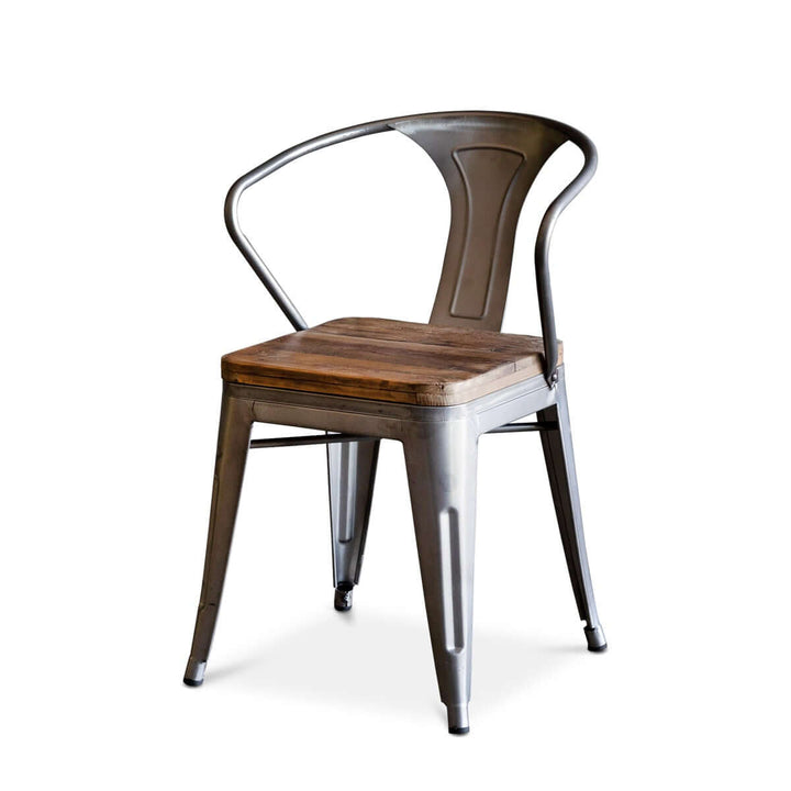 Rustic industrial dining chair with reclaimed wood seat and metal frame, blending vintage charm and modern style.