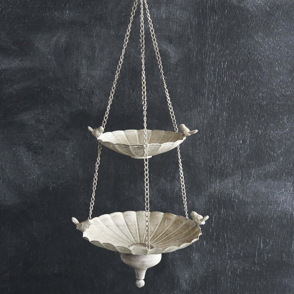 Victorian hanging bird feeder with tiered basins and antique stone finish, perfect for garden decor.
