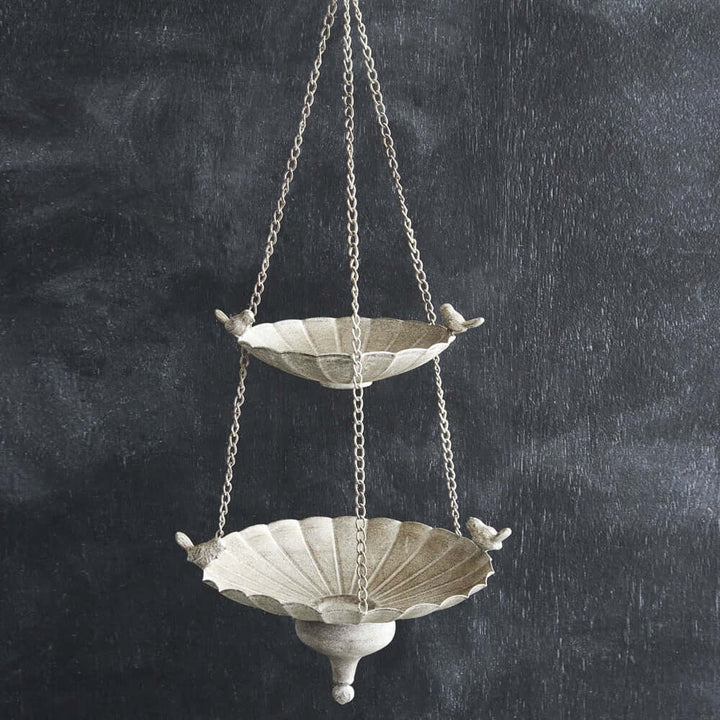Victorian hanging bird feeder with tiered basins and antique stone finish, perfect for garden decor.