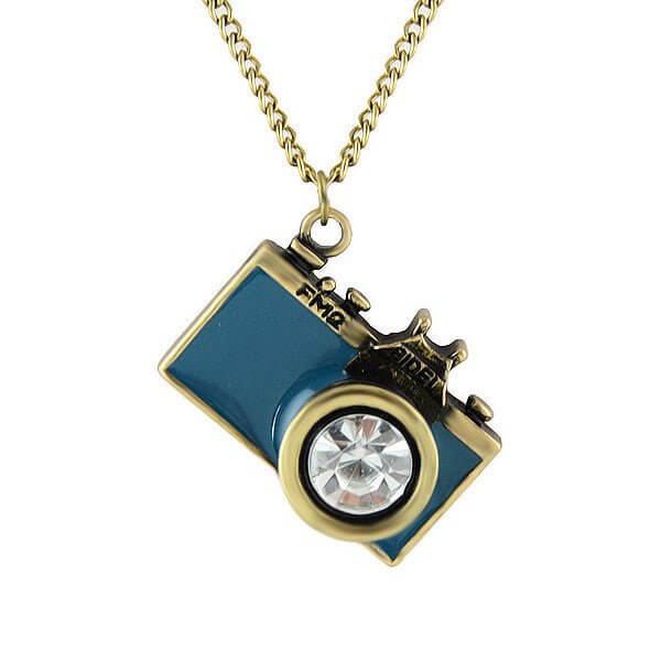 Vintage Camera Pendant Necklace with antique brass and teal enamel design, featuring a sparkling crystal lens.
