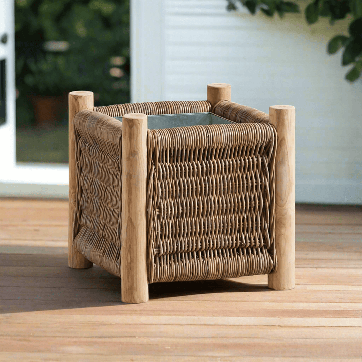 Vintage Rattan Planter with Teak Legs on outdoor deck