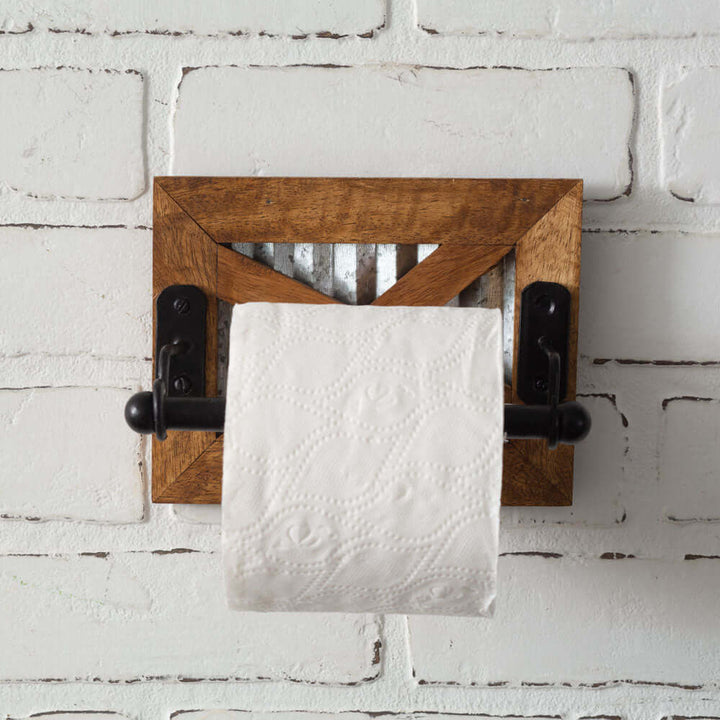 Antique farmhouse toilet paper holder in wood and metal design, adding rustic charm to bathroom decor.