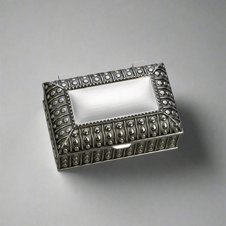 Antique-Style Silver Jewelry Box with ornate beaded detailing and vintage charm, capturing early 20th-century craftsmanship.