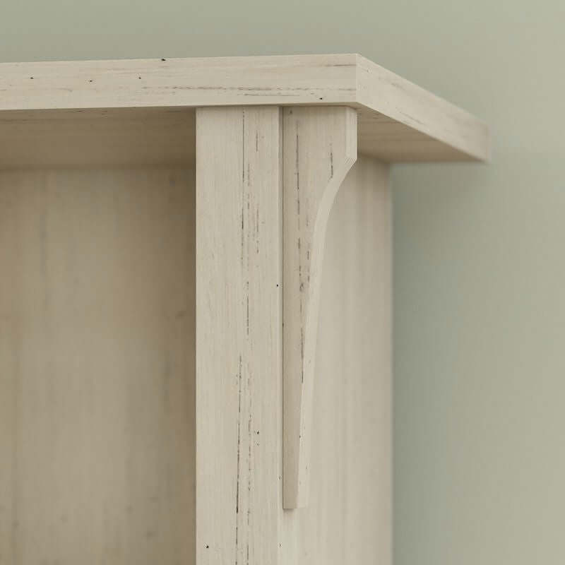 Close-up of Antique White Entryway Hall Tree with Storage Bench showcasing its distressed antique white finish.