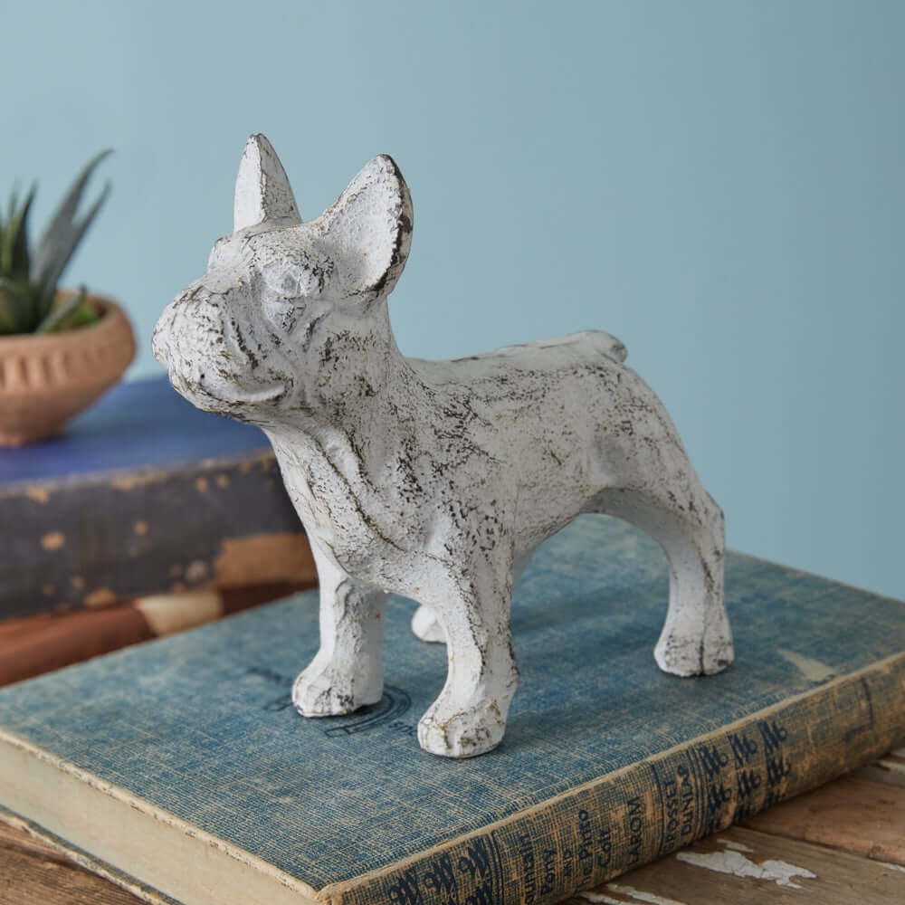 Antique white French Bulldog figurine made of durable cast iron, showcasing vintage charm and old-world appeal.
