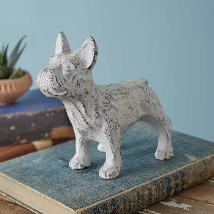 Antique white French Bulldog figurine made of durable cast iron, showcasing vintage charm and old-world appeal.