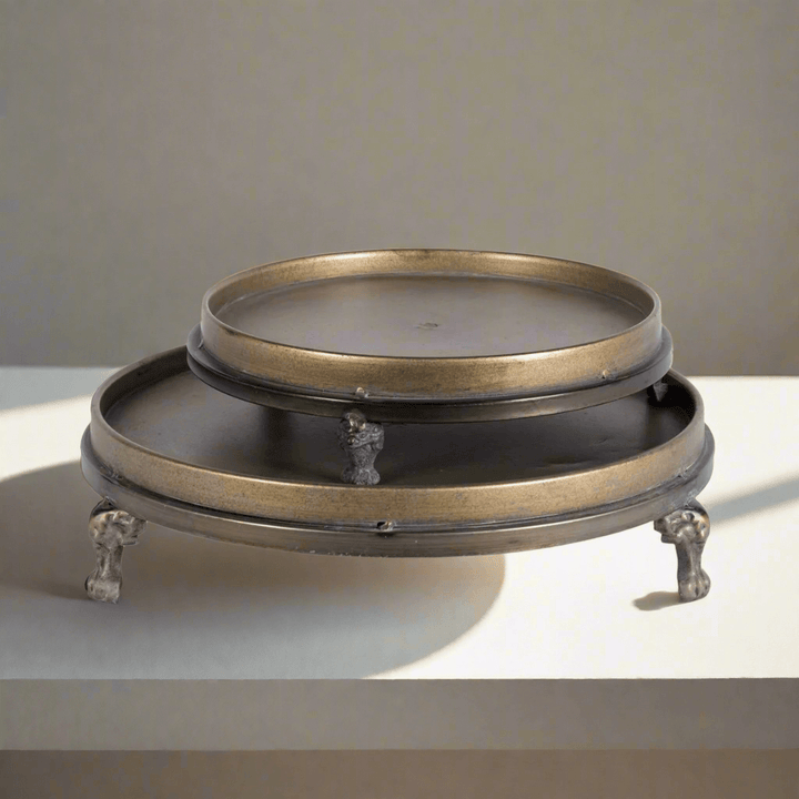 Antique Brass Footed Display Trays (Set of 2) on white surface with elegant design