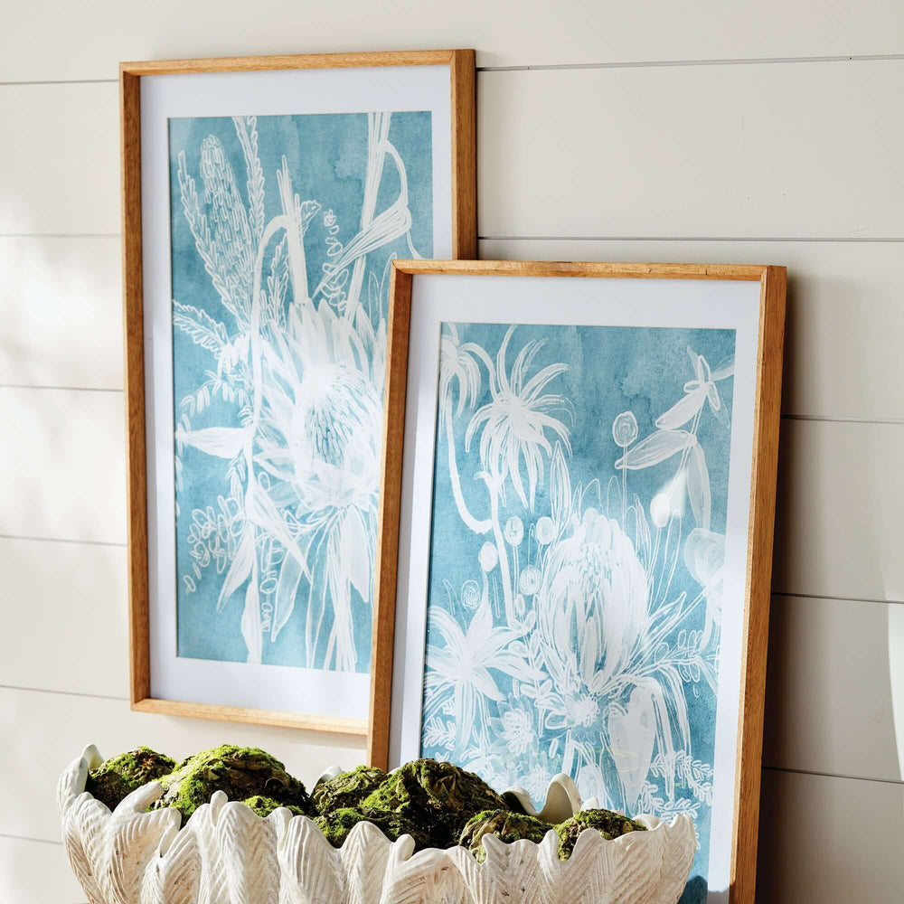 Cyanotype-inspired protea wall art set of 4 in wood frames, showcasing elegant botanical designs on indigo backgrounds.