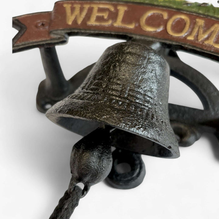 Farmhouse Cast Iron Cow Welcome Sign with Bell featuring rustic charm and traditional country homestead design.