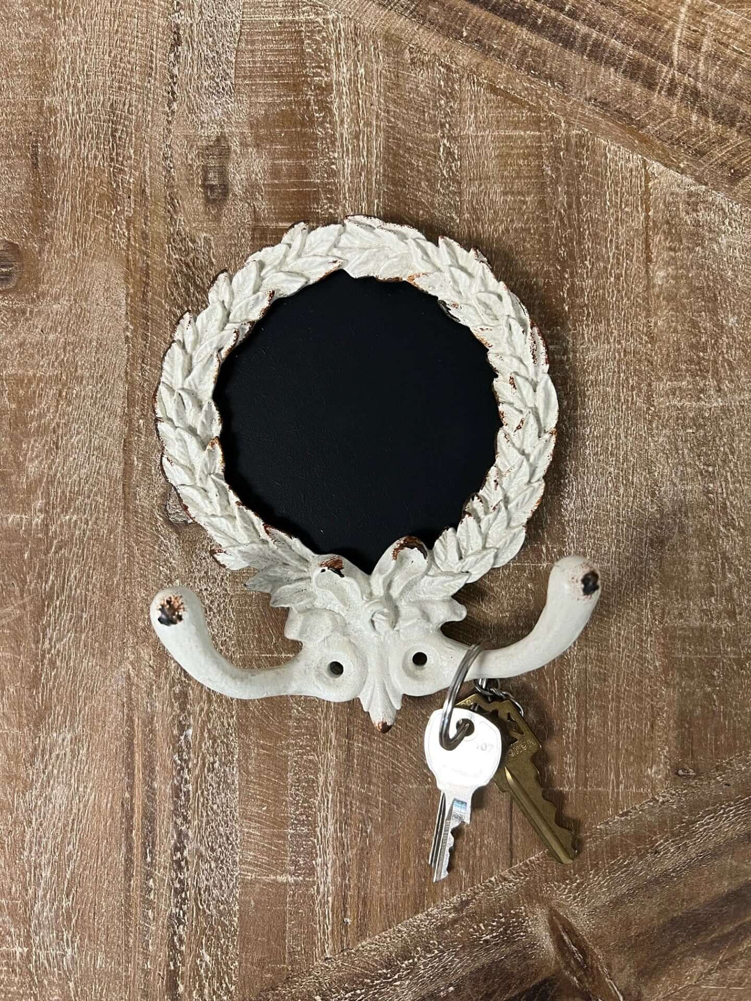 French Country wall hook with chalkboard, featuring a decorative design and space for keys.