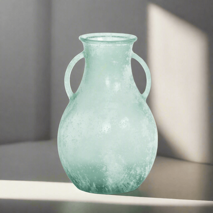 Frosted Seafoam Glass Vase with Handles showcasing a frosted finish and twin handles, reminiscent of coastal sea glass elegance.