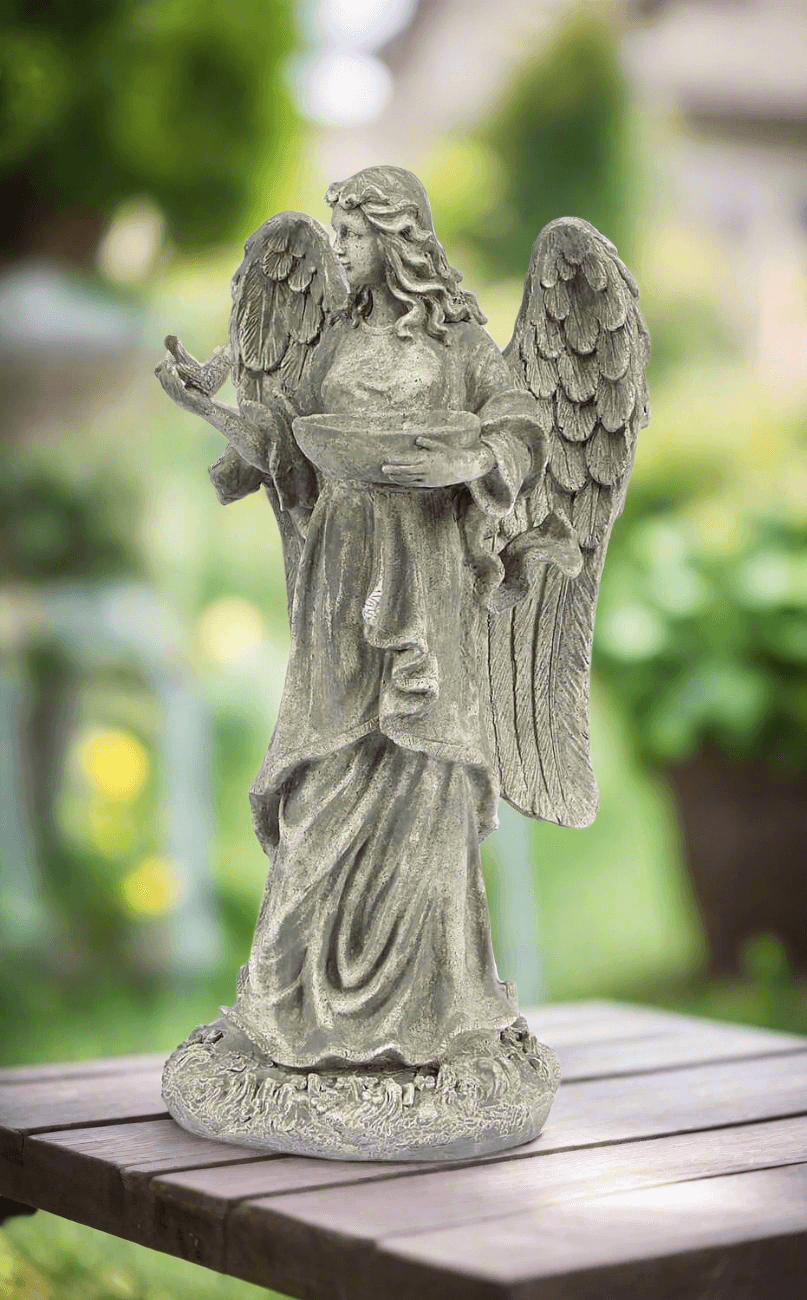 Garden Angel Statue Bird Feeder on table outdoors