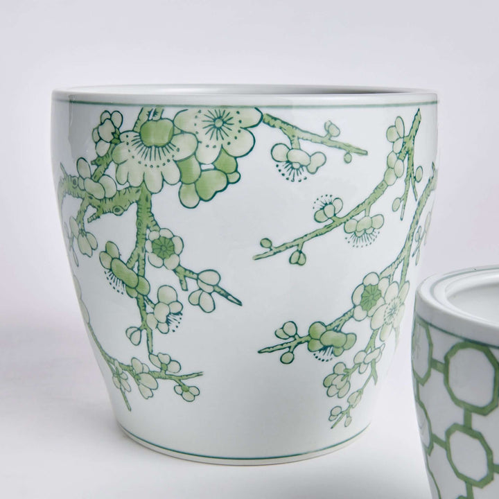 Green and white chinoiserie ceramic planter with floral design, perfect for elegant home decor.