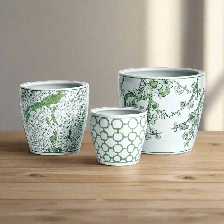 Set of 3 green and white chinoiserie ceramic planters enhancing home decor with timeless elegance.