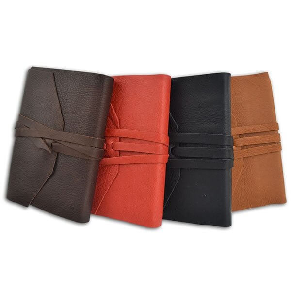 Handcrafted Italian Leather Wrap Journal in four colors displayed in a row