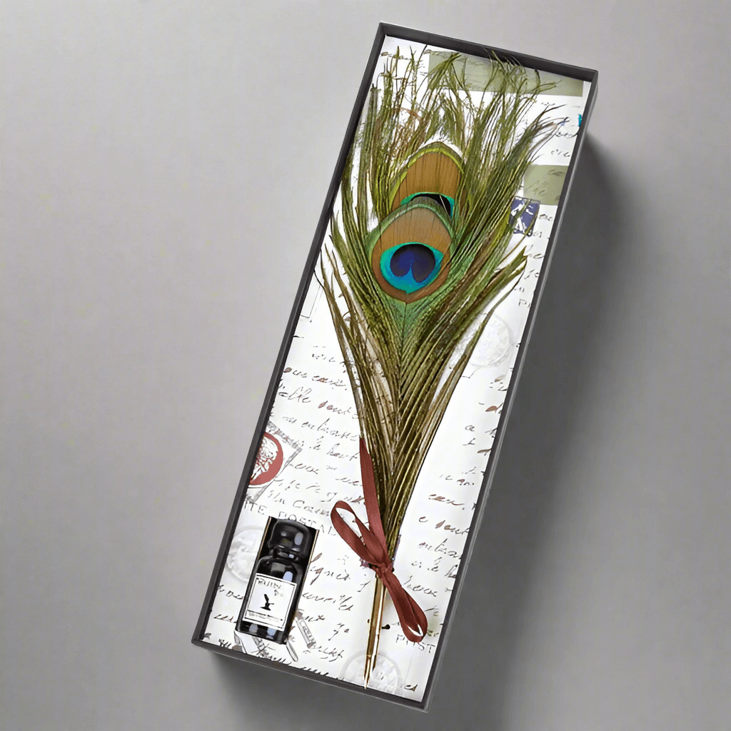 Peacock Feather Quill Pen & Ink Set beautifully presented in a gift box, featuring elegant design and authentic materials.