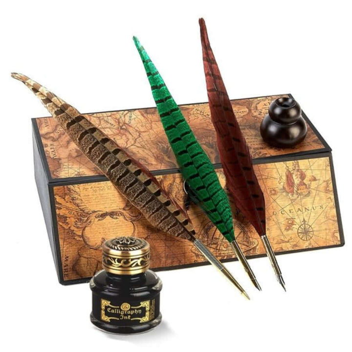 Pheasant Feather Quill Pen set with ink bottle and vintage map background, showcasing old-world charm and elegance.