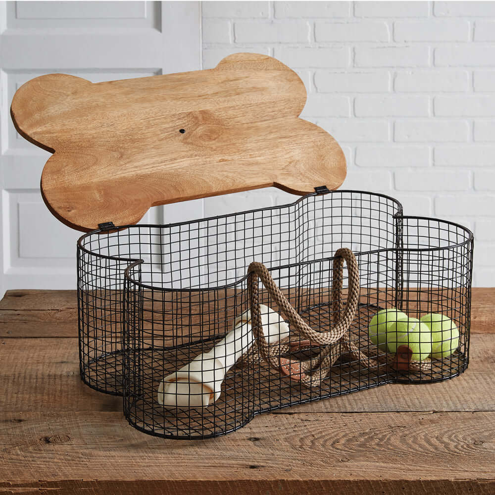 Rustic Dog Bone Toy Storage Basket with wooden lid and metal wire design on wooden table, perfect for organizing pet toys.