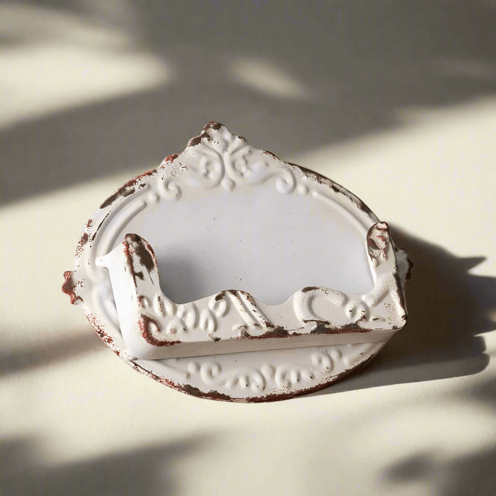 Vintage-inspired distressed metal cottagecore business card holder, elegant design for stylish desk organization.