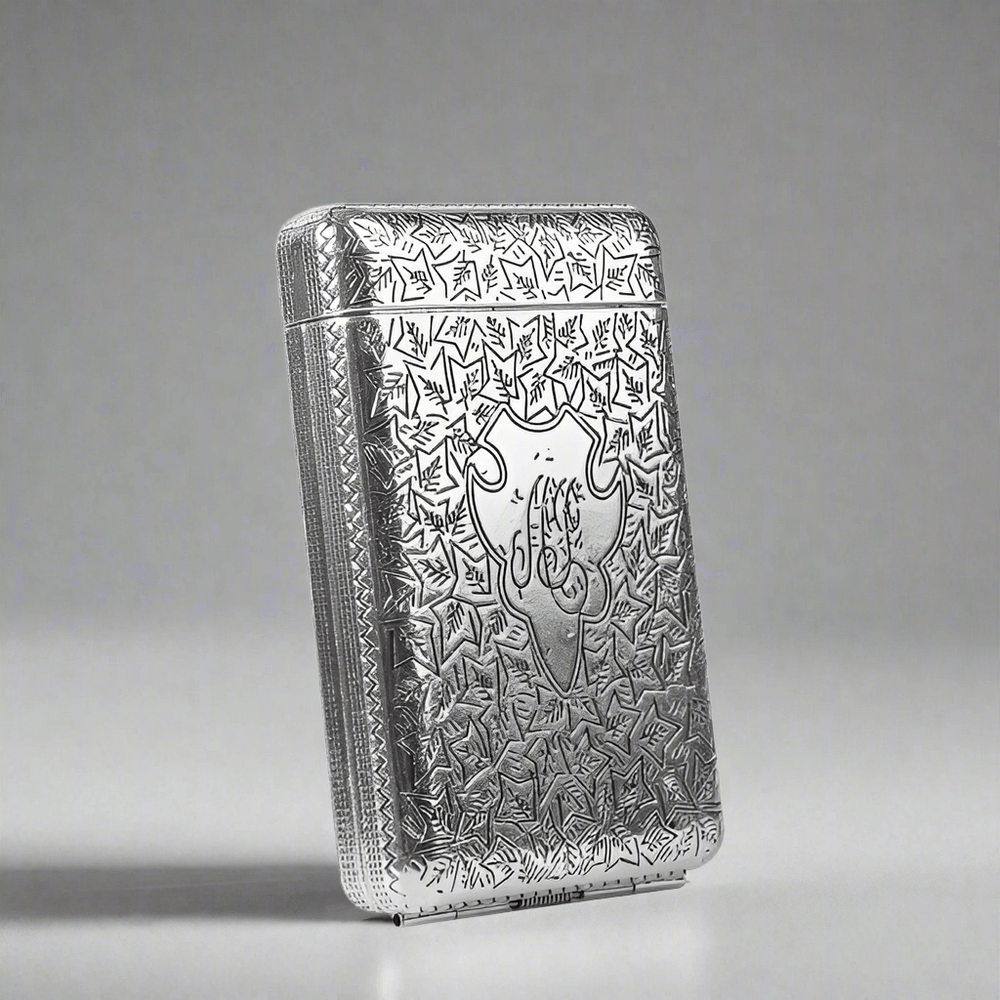 Vintage 1920s Cigarette Case with etched metal design showcasing Roaring Twenties elegance, featuring a spring-loaded hinge.