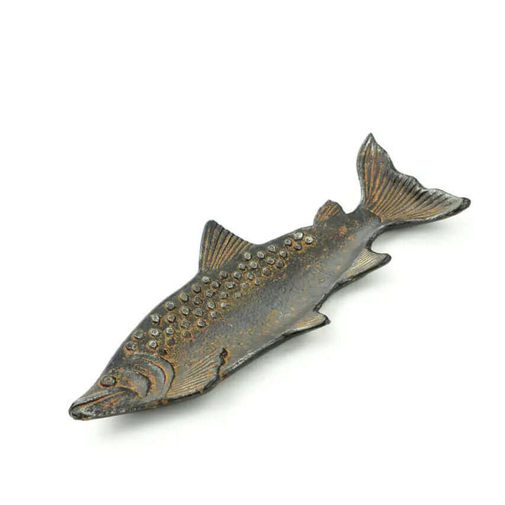 Vintage cast iron fish-shaped tray with rustic patina detailing, capturing lifelike curved scales and a charming aged finish.