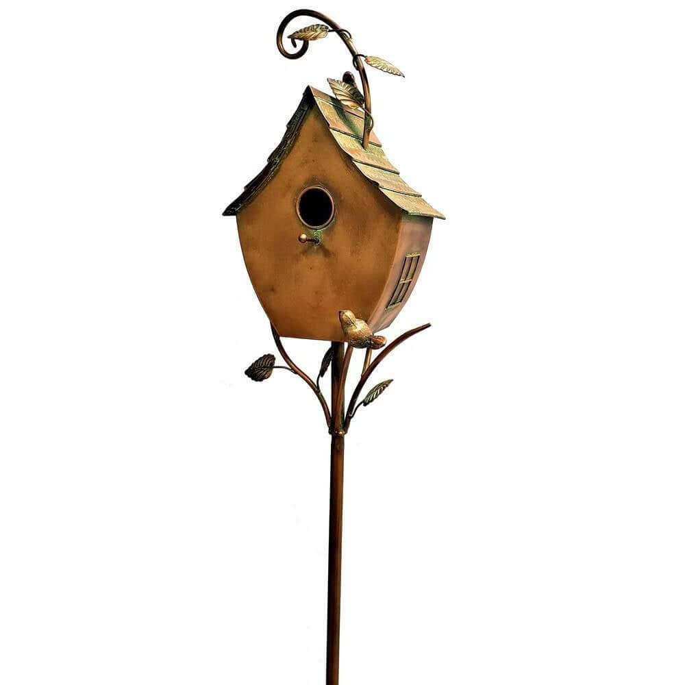 Vintage Copper Birdhouse on Garden Stake, handcrafted decor with antique finish, featured in a classic garden setting.