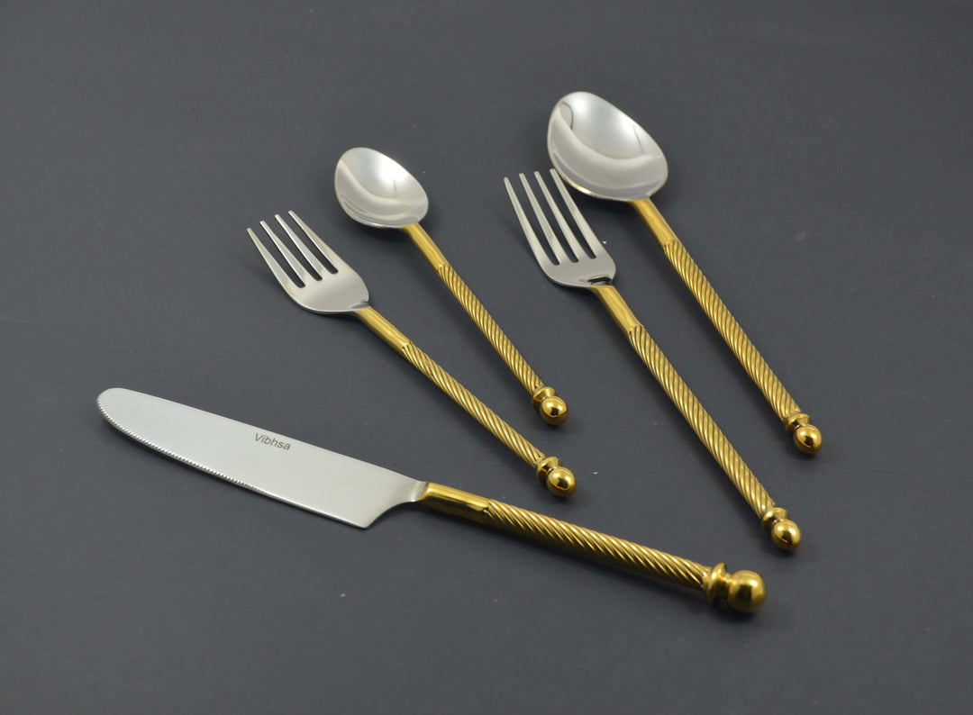 Vintage Gold Swirl Handle Flatware Set (20-Piece) on display with twisted golden handles and stainless steel heads.