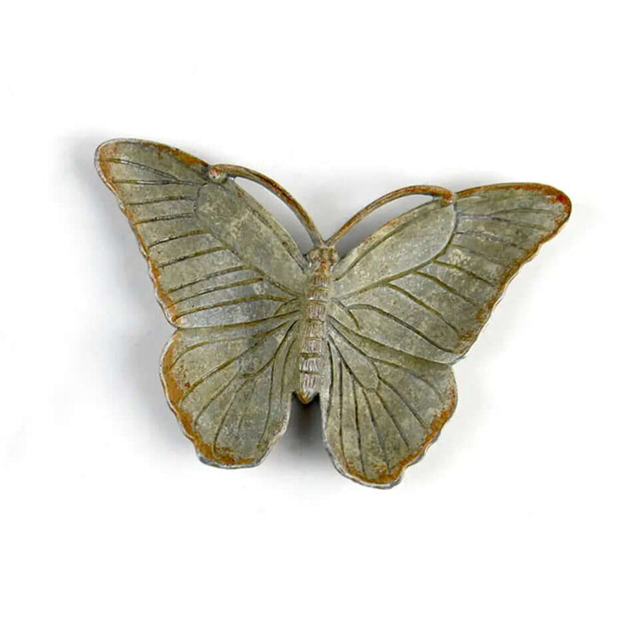 Vintage pewter butterfly trinket dish with antique zinc finish, featuring subtle bronze hues and nostalgic design.