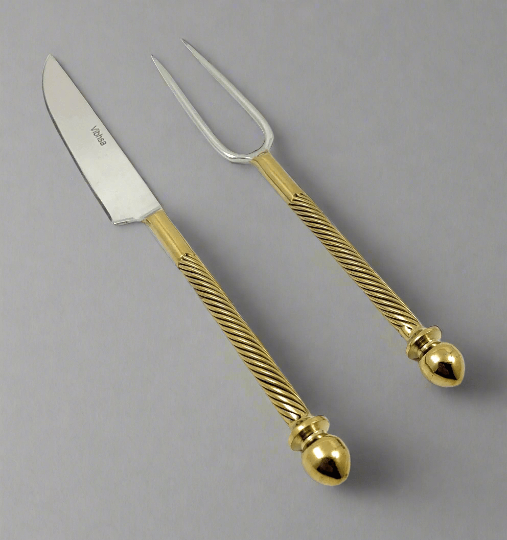Vintage Stainless Steel Carving Set with Golden Handles featuring a knife and fork with elegant gold swirl handles.