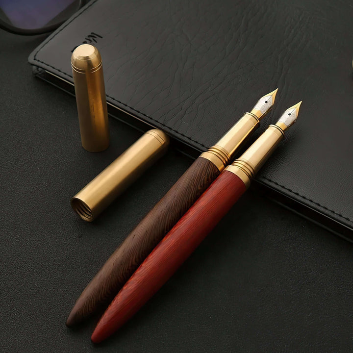 Vintage Wood and Brass Fountain Pen | The Hemmingway with gold accents on black leather notebook