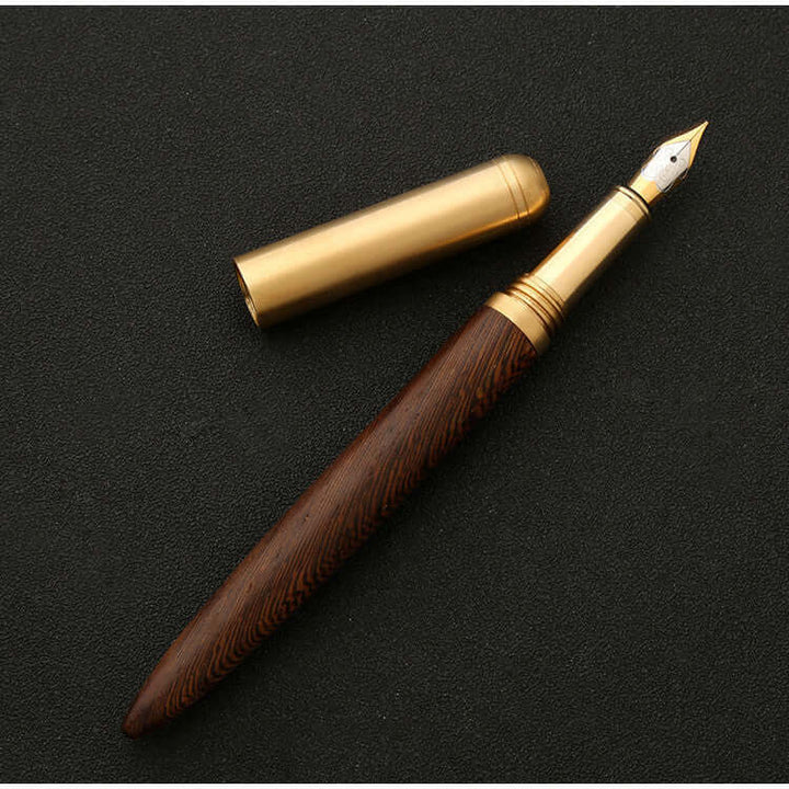 Vintage Wood and Brass Fountain Pen | The Hemmingway displayed with cap removed on black background
