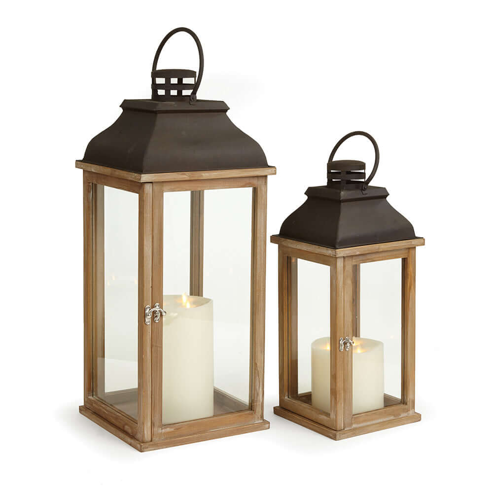 Vintage wood and metal lantern set with glass panels for rustic home decor, featuring candlelight glow.