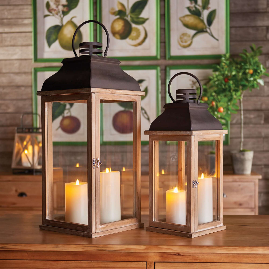 Vintage wood and metal lantern set with glass panels, perfect for rustic decor and cozy lighting.