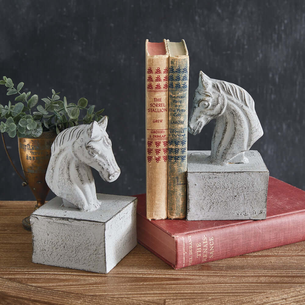 Vintage Cast Iron Horse Bookends (Set of 2) displayed with classic books on a wooden shelf, adding rustic elegance to decor.