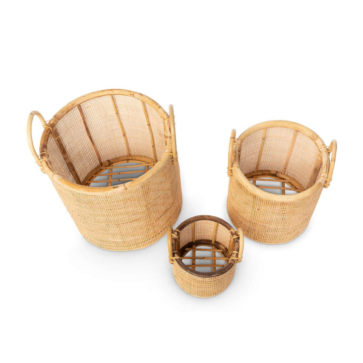 Set of 3 Vintage Coastal Woven Rattan Baskets with Handles showcasing varying sizes, ideal for home organization and decor.
