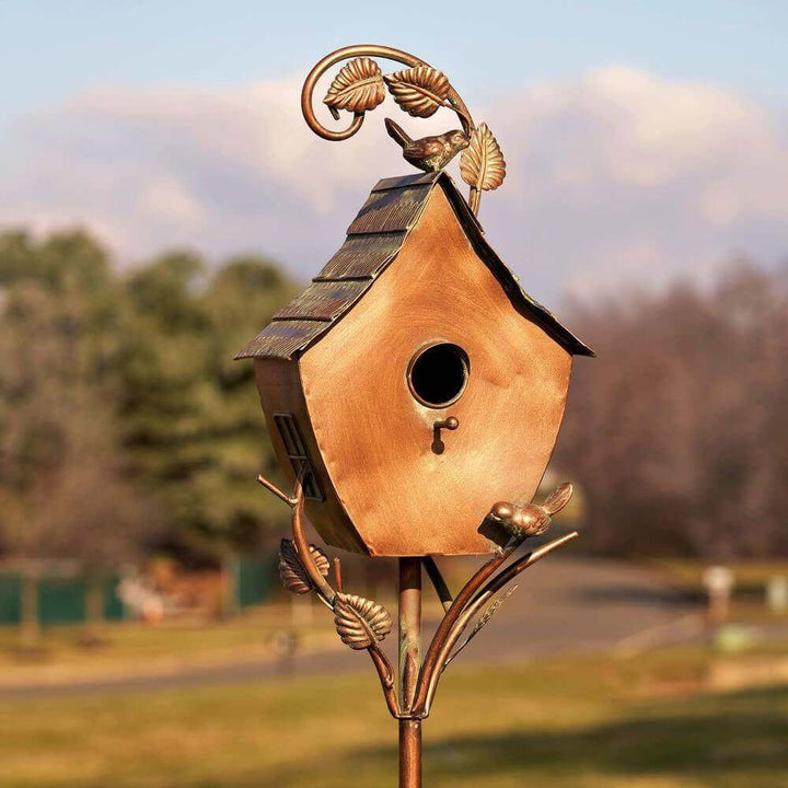 Vintage Copper Birdhouse on Garden Stake with antique finish and nature-inspired design, ideal for enhancing outdoor décor.