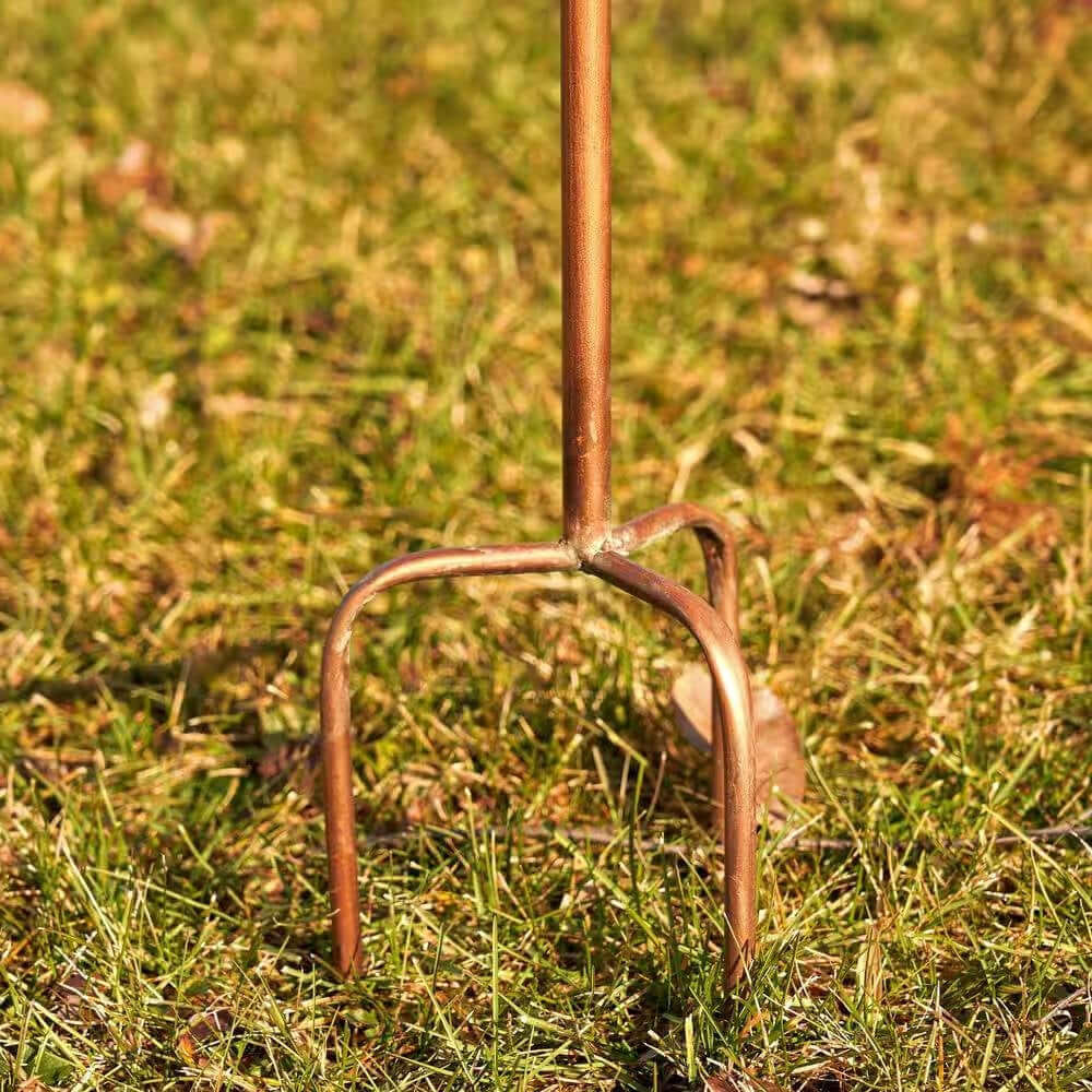 Vintage Copper Birdhouse on Garden Stake base on grass lawn