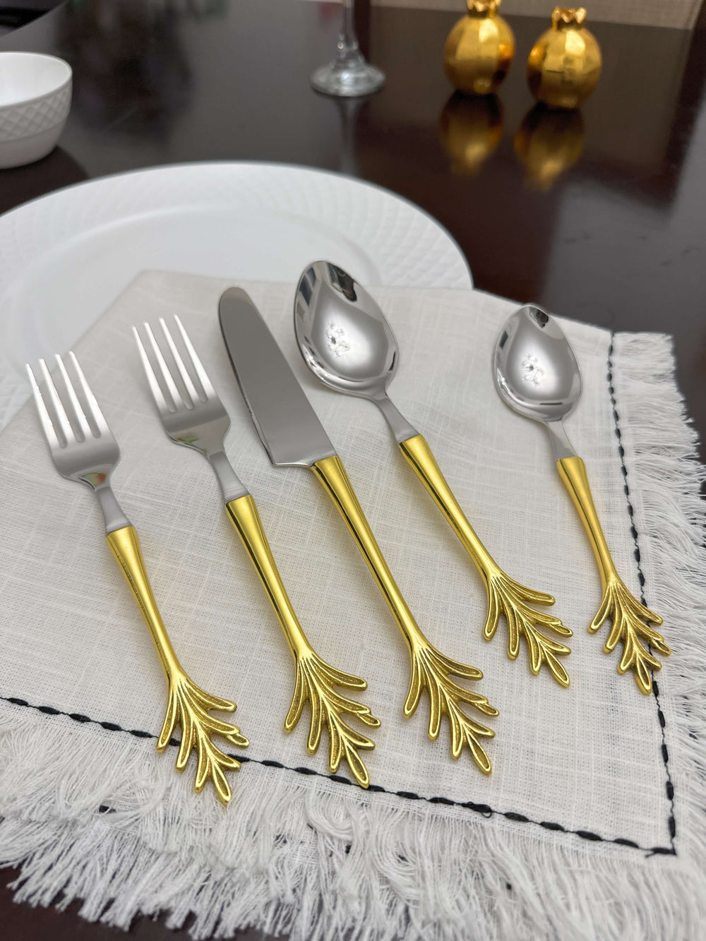 Vintage Gold Leaf Handle Flatware Set (20-Piece) displayed on elegant table setting.