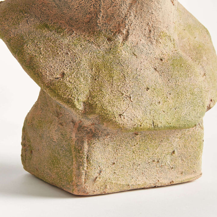 Close-up of moss terracotta male bust planter, showcasing rustic texture and vintage allure reminiscent of ancient Roman sculptures.