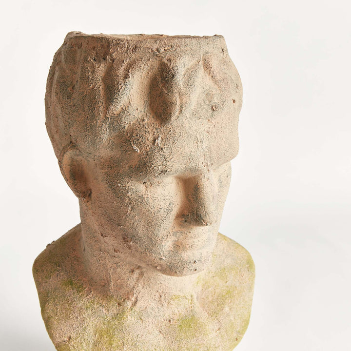 Vintage moss terracotta male bust planter with a Roman-inspired design, capturing the essence of classical elegance and nature's charm.