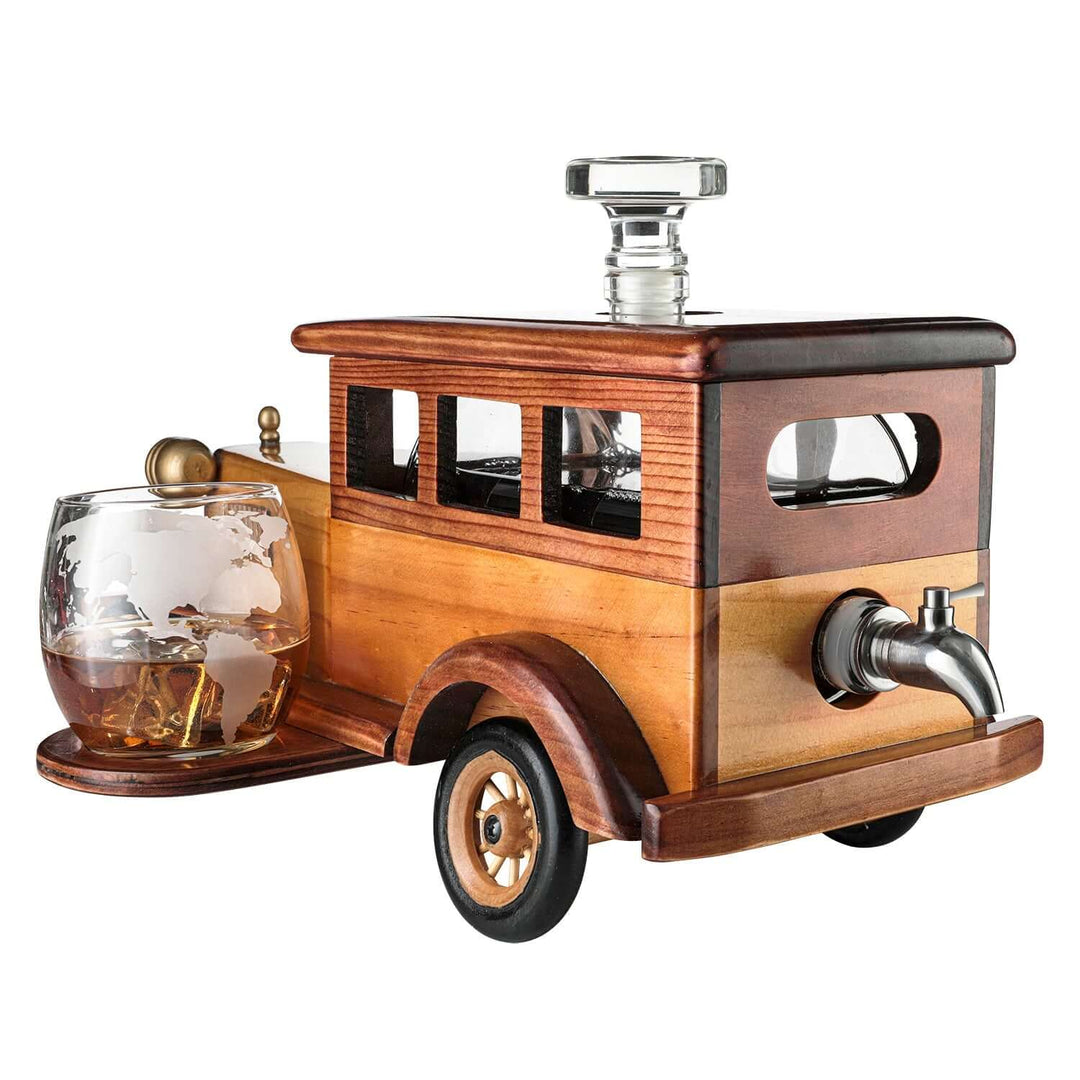 Wooden car-shaped decanter with glass and tap on a white background