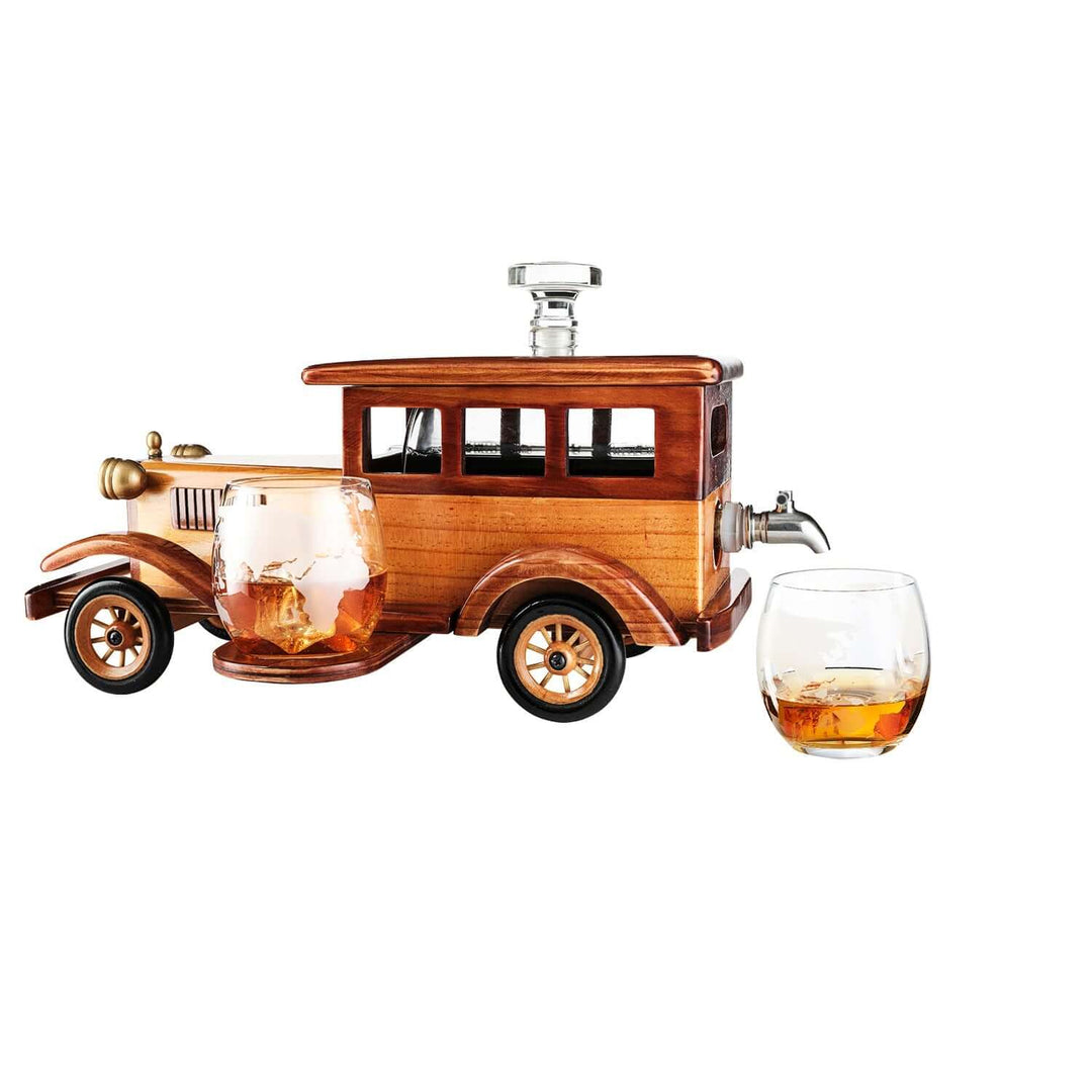 Wooden car-shaped decanter with two glasses on a white background