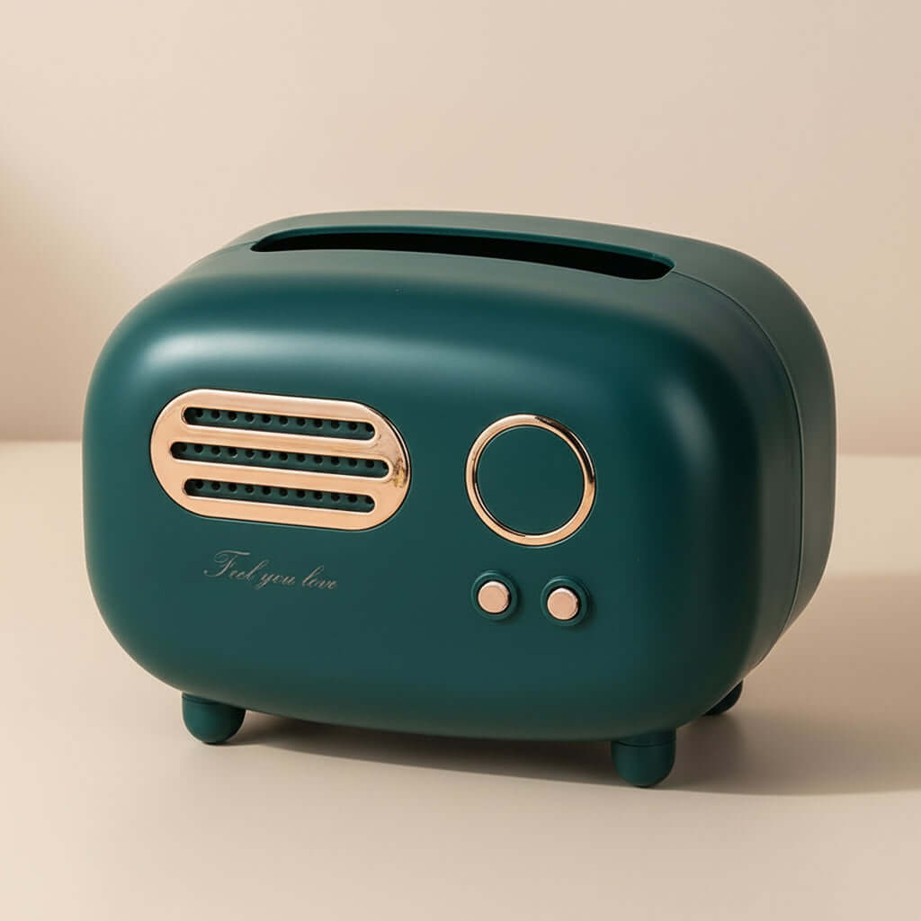 Green vintage-style radio-shaped tissue box with rose gold accents on a white background