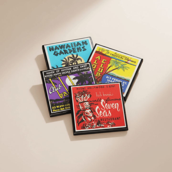 Set of colorful coasters with various designs on a beige surface