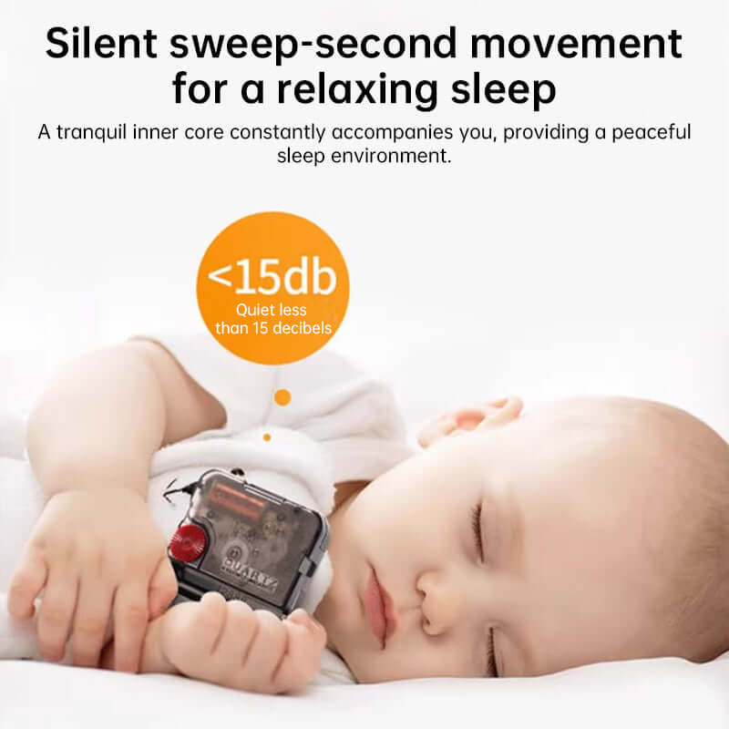 Baby sleeping with a device labeled '15db' on a white background