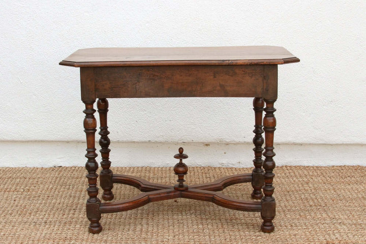 19th Century French Walnut Antique Writing Table with ornate turned legs, showcasing provincial elegance and design finesse.